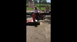 Nanny rides a child’s go kart