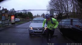 UK cyclist caught on camera being 'car doored' by careless passenger