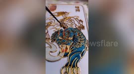 Chinese artist creates incredibly detailed cloisonne image on phone case