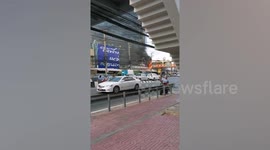 Overhead power lines burst into flames at junction in Bangkok