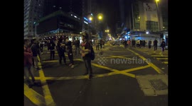 Riot police charges on Nathan road, to clear obstruction by protesters