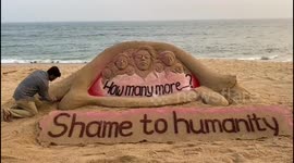 Sand artist created a sand sculpture with Women Artists Protest Rape & Murder of Hyderabad Doctor in southern india.