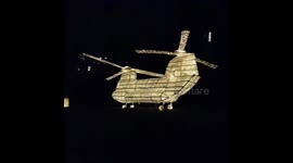 Whaleybridge  lantern parade featuring the Large RAF chinook tribute to the emergency  services , raf and volunteers  that saved toddbrook reservoir  and the town