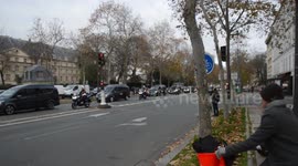 Parisians line the streets to pay tribute to 13 French soldiers that died in helicopter crash