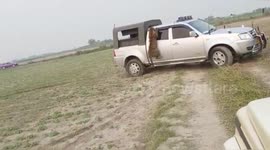 Leopard viciously leaps at rescue workers trying to save it in rural India