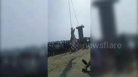 Crocodile trapped in 45-foot-deep pit lifted out with winch after 17 hours in north India