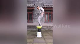 Chinese man shows off incredible kung fu skills by 'jumping' on water
