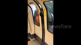 Moment former London mayor Ken Livingstone sticks foot in Tube door to delay train