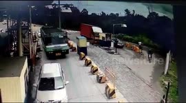 Shocking scene as container truck rams into toll booth on south Indian road