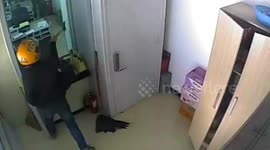 Chinese man arrested after attempting to rob bank with axe