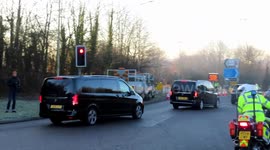 Large police motorcade approaches NATO summit in Watford as Trump's helicopter flies overhead