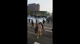 Tear gas used to disperse protesters and marchers in Hong Kong