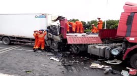 Truck hits two vehicles after crashing through highway's central reservation in China