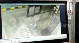Indian toll booth camera shows employee sent flying back when truck smashes into his station