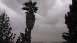 A perfect sunny day in South Africa turns dark and windy