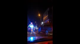 US Presidential motorcade drives through Tottenham, London