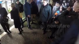 Actor Hugh Grant challenged by anti-racism protesters while campaigning for Labour candidate