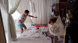 Adorable moment of Filipino father performing funky dance to entertain his baby