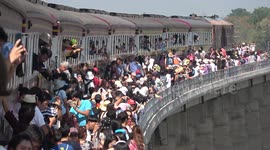 Train that 'floats' across dam is an unlikely hit with tourists