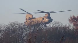Military Chinook & Marine One Helicopters landing during NATO Summit London