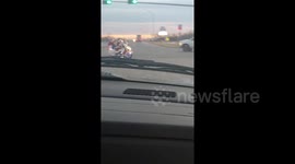 'I saw him run the red light': Man dressed as Santa spotted riding festively lit motorbike