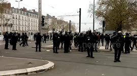 Policeman throw a woman to the ground