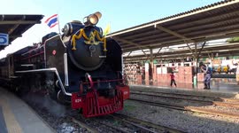 Steam train leaving Bangkok on Father's Day
