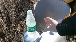 Bottled mineral water freezes in seconds when smashed against metal in northern China