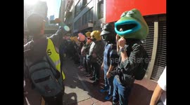 Hong Kong Protesters create huge human chains with animal masks