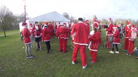 People Gather For The London Santa Run In Victoria Park