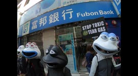 Hong Kong Protesters create huge human chains with animal masks