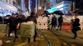 8th December 2019 - Frontline protesters strengthening barricades in Central, Hong Kong after a peaceful protest march