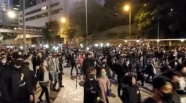 Hong Kong 8th December 2019 - Protesters march through the streets of Admiralty while chanting