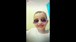 My son with new sun glass