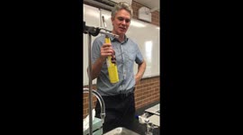 Science teacher demonstrates what happens when chocolate Santa Claus climbs down the wrong chimney