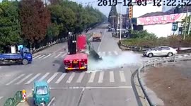 Panes of glass fall from truck and shatter on top of biker in China