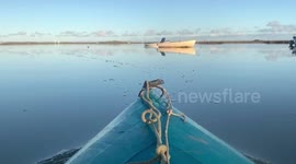 Ice blue winter sea kayak