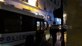 Protestors in Paris arrested hauled off in police bus as general strike continues