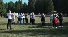 Older people exercise in nature