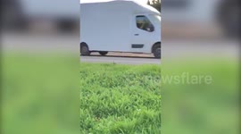 Driver pulled over by police after attempting to transport a DOUBLE mattress in her BMW convertible