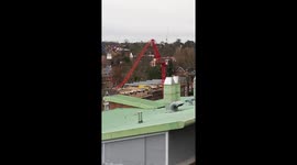 Crane collapses over building site in London due to high winds