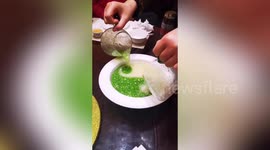 Skilful waiter in Shanghai creates Yin Yang pattern in bowl of soup