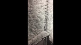 Strange snow formations on house after big blizzard
