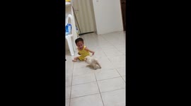 Heartwarming moment 'super capable' boy with medical conditions in Ecuador plays with his lovable puppy