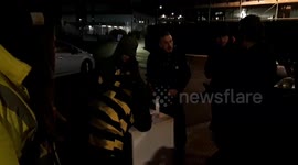 Climate activist dressed as a bee glued to fridge outside Boris Johnson's speech venue