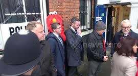UK election: Woman in giant Elmo suit gatecrashes Jeremy Corbyn's visit to London polling station