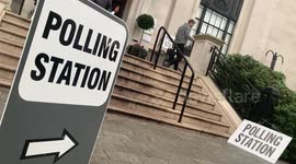 Voters arrive at Islington Town Hall polling station