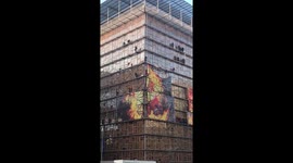 Environmental activists scale EU headquarters in Brussels