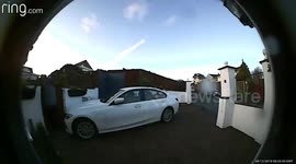 Suspected burglar caught on camera peeking into home before saying 'there's people in there. I can't break into your house'