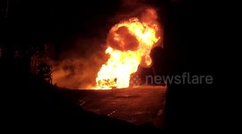 Gasoline transport bursts into flames on rural Indonesian road